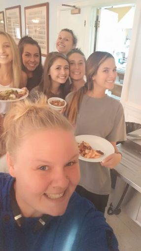 Blue Coat Chef Christina poses with sorority members at lunch